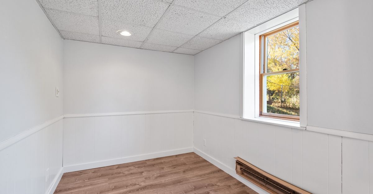 Tile to Trendy in a Weekend: Lay Vinyl Panels Over Old Tile for an Instant Makeover