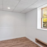 Tile to Trendy in a Weekend: Lay Vinyl Panels Over Old Tile for an Instant Makeover